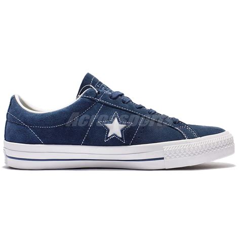 navy blue suede converse.